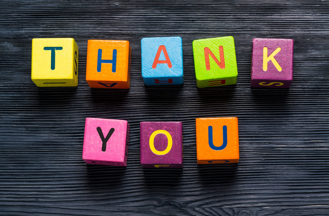 Tablet Pc with Text Thank You with Blue Background