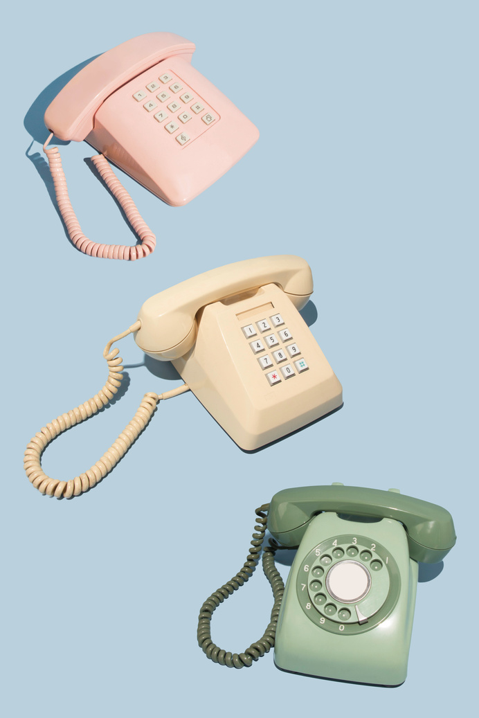 Colorful Vintage Telephone on Blue Background